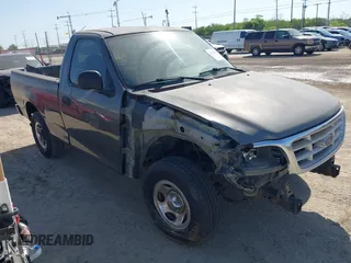 2003 Ford F-150 XL with VIN 1FTRF17273NB64646, listed as a IAAI auction lot 41986850 with 180,601 mi miles. Bid and sale history available at carsss.com. Image 1.