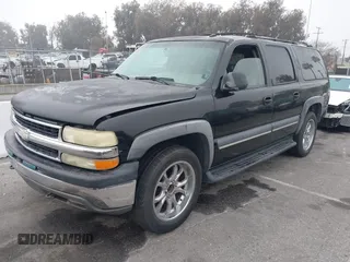 2003 Chevrolet Suburban LT z VIN 3GNFK16Z33G213287, wystawiony jako IAAI lot #41670719 z przebiegiem 190 245 mil mil oraz . Historia ofert i sprzedaży dostępna na DreamBid. Obrazek 2.