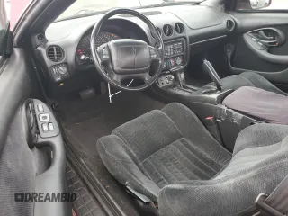2000 Pontiac Firebird Firebird z VIN 2G2FS22K6Y2143127, wystawiony jako Copart lot #72041384 z przebiegiem 181 787 mil mil oraz Szkoda całkowita • Salvage title. Historia ofert i sprzedaży dostępna na DreamBid. Obrazek 8.