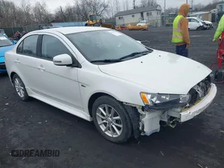 2016 Mitsubishi Lancer ES with VIN JA32U2FU3GU008324, listed as a IAAI auction lot 41941890 with 68,065 mi miles. Bid and sale history available at carsss.com. Image 1.