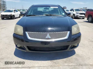 2010 Mitsubishi Galant ES z VIN 4A32B3FF4AE007728, wystawiony jako Copart lot #55102034 z przebiegiem 208 463 mil mil oraz Szkoda całkowita • Salvage title. Historia ofert i sprzedaży dostępna na DreamBid. Obrazek 5.