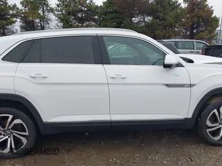 2021 Volkswagen Atlas SEL Premium with VIN 1V2TC2CAXMC214243, listed as a IAAI auction lot 41200408 with 54,902 mi miles and . Bid and sale history available at DreamBid. Image 14.