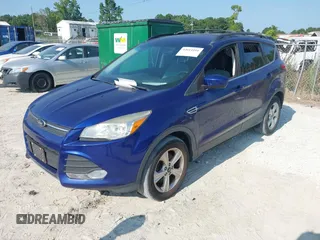 2013 Ford Escape SE with VIN 1FMCU9GX5DUD32339, listed as a IAAI auction lot 42614416 with 151,402 mi miles and . Bid and sale history available at DreamBid. Image 2.