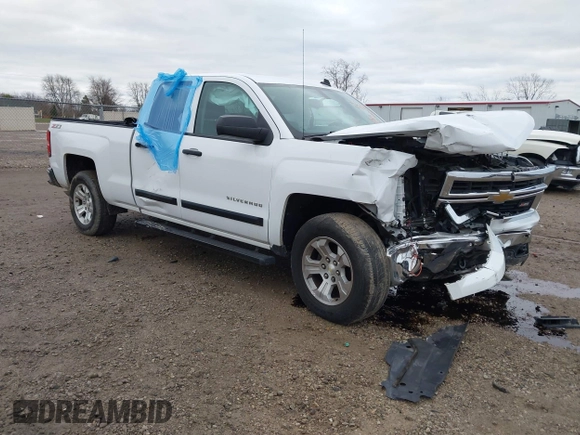 2014 Chevrolet Silverado 1500 LT with VIN 1GCVKREC2EZ390061, listed as a IAAI auction lot 40824477 with 140,928 mi miles and . Bid and sale history available at DreamBid. Image 1.