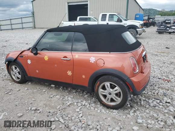 2006 MINI Convertible with VIN WMWRF335X6TG15824, listed as a Copart auction lot 56163205 with 113,109 mi miles and Salvage title. Bid and sale history available at DreamBid. Image 2.