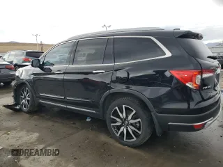 2022 Honda Pilot Touring 7-Passenger with VIN 5FNYF6H62NB084022, listed as a Copart auction lot 44793355 with 62,906 mi miles and Salvage Title. Bid and sale history available at carsss.com. Image 2.