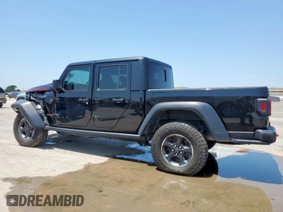 2023 Jeep Gladiator Rubicon with VIN 1C6JJTBG6PL524721, listed as a Copart auction lot 59091505 with 45,107 mi miles and Salvage title. Bid and sale history available at DreamBid. Image 2.