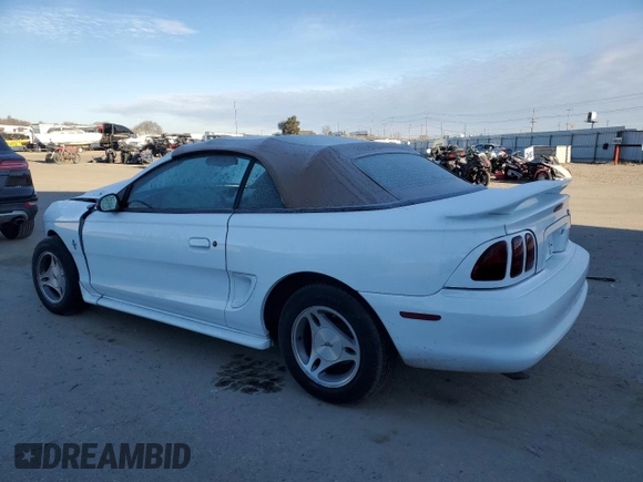 1998 Ford Mustang with VIN 1FAFP4440WF160806, listed as a Copart auction lot 42334235 with 82,105 mi miles and Salvage Title. Bid and sale history available at carsss.com. Image 2.