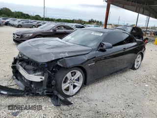2015 BMW M4 with VIN WBS3U9C57FJ968511, listed as a Copart auction lot 49293404 with 0 mi miles. Bid and sale history available at carsss.com. Image 1.