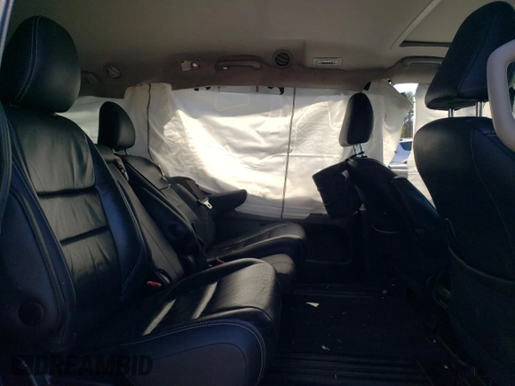 2016 Toyota Sienna SE с VIN 5TDXK3DC6GS749813, выставлен на аукционе Copart как лот 52519645 с пробегом 137 960 миль миль и Списание • Salvage title. История ставок и продаж доступна на DreamBid. Изображение 11.