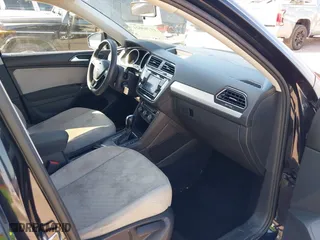 2018 Volkswagen Tiguan S with VIN 3VV1B7AX6JM036407, listed as a IAAI auction lot 41705021 with 84,171 mi miles. Bid and sale history available at carsss.com. Image 5.