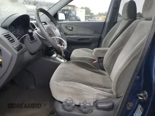 2005 Hyundai Tucson GLS with VIN KM8JN12D05U074879, listed as a Copart auction lot 73746674 with 0 mi miles and Salvage Title. Bid and sale history available at carsss.com. Image 7.
