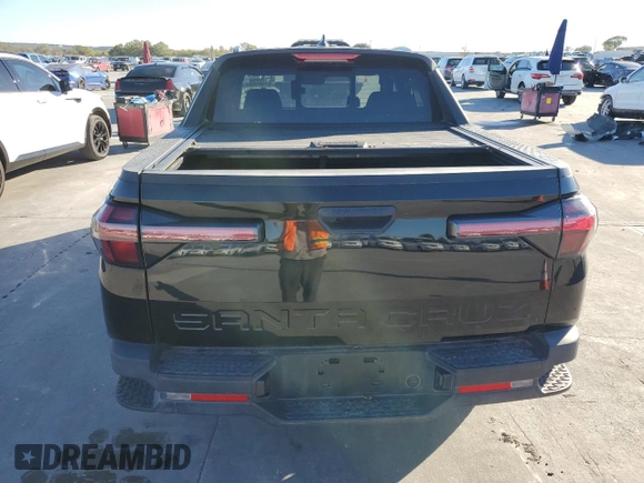 2022 Hyundai Santa Cruz SEL z VIN 5NTJC4AE3NH009820, wystawiony jako Copart lot #81565084 z przebiegiem 16 830 mil mil oraz Szkoda całkowita • Salvage title. Historia ofert i sprzedaży dostępna na DreamBid. Obrazek 6.