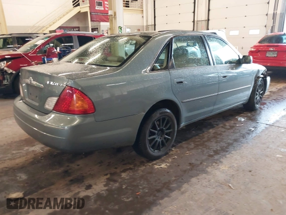 2000 Toyota Avalon XL with VIN 4T1BF28B9YU111753, listed as a IAAI auction lot 41243138 with 113,324 mi miles and . Bid and sale history available at DreamBid. Image 4.