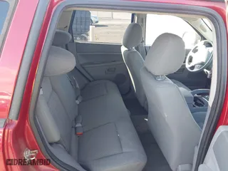 2006 Jeep Grand Cherokee Laredo with VIN 1J4GR48KX6C128491, listed as a IAAI auction lot 41949301 with 183,791 mi miles. Bid and sale history available at carsss.com. Image 8.