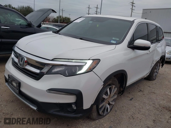2020 Honda Pilot EX-L with VIN 5FNYF5H55LB029238, listed as a IAAI auction lot 41330490 with 116,787 mi miles. Bid and sale history available at carsss.com. Image 17.