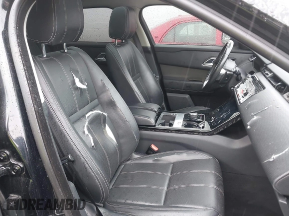 2020 Land Rover Range Rover Velar S z VIN SALYB2EX7LA265410, wystawiony jako IAAI lot #41840054 z przebiegiem 80 795 mil mil oraz . Historia ofert i sprzedaży dostępna na DreamBid. Obrazek 17.