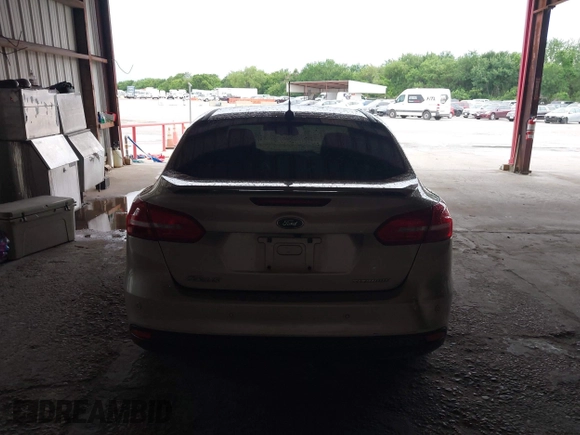 2017 Ford Focus Titanium with VIN 1FADP3J26HL279839, listed as a IAAI auction lot 42466826 with 202,795 mi miles and . Bid and sale history available at DreamBid. Image 16.