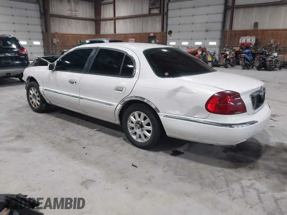 2001 Lincoln Continental with VIN 1LNHM97V81Y667328, listed as a IAAI auction lot 41730916 with 126,179 mi miles and . Bid and sale history available at DreamBid. Image 3.