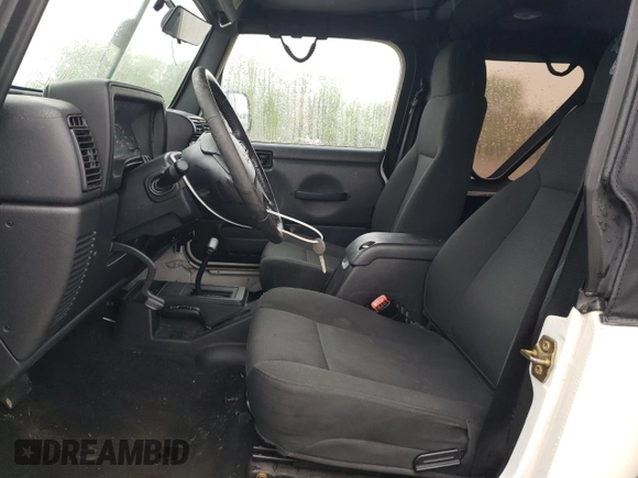 2006 Jeep Wrangler X with VIN 1J4FA39S56P742837, listed as a Copart auction lot 58166415 with 97,224 mi miles and Salvage title. Bid and sale history available at DreamBid. Image 7.