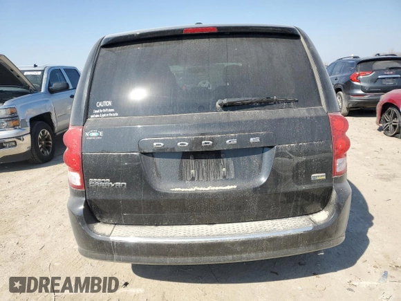 2015 Dodge Grand Caravan SE with VIN 2C4RDGBGXFR567989, listed as a Copart auction lot 55783925 with 275,012 mi miles and Salvage Title. Bid and sale history available at DreamBid. Image 6.