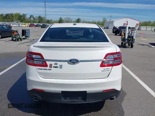 2016 Ford Taurus SEL with VIN 1FAHP2E88GG131659, listed as a IAAI auction lot 42205065 with 99,416 mi miles and . Bid and sale history available at DreamBid. Image 16.