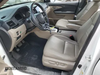 2021 Honda Pilot Touring 7-Passenger z VIN 5FNYF6H68MB077008, wystawiony jako Copart lot #54133735 z przebiegiem 96 052 mil mil oraz Szkoda całkowita • Salvage title. Historia ofert i sprzedaży dostępna na DreamBid. Obrazek 7.