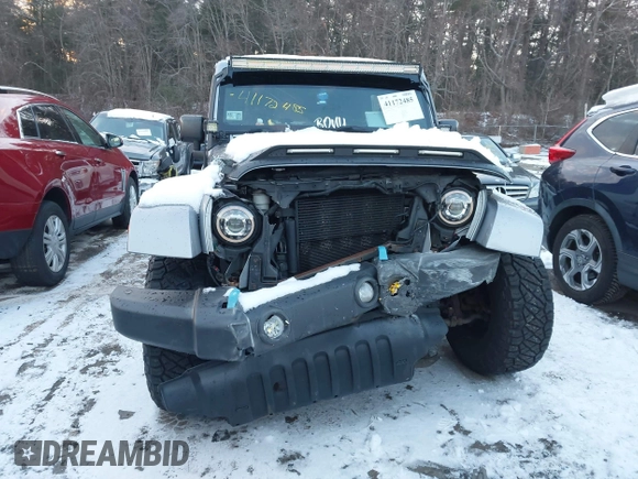 2015 Jeep Wrangler Unlimited Rubicon Hard Rock with VIN 1C4HJWFG1FL659803, listed as a IAAI auction lot 41172485 with 126,881 mi miles and . Bid and sale history available at DreamBid. Image 12.