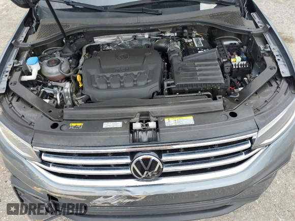 2023 Volkswagen Tiguan S z VIN 3VVRB7AX4PM043335, wystawiony jako Copart lot #59045145 z przebiegiem 31 659 mil mil oraz Szkoda całkowita • Salvage title. Historia ofert i sprzedaży dostępna na DreamBid. Obrazek 12.