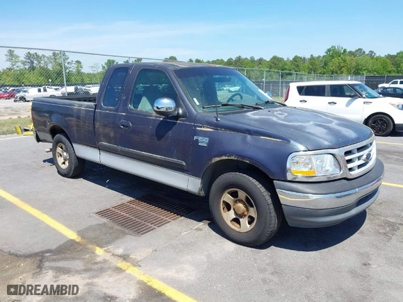 1999 Ford F-150 Work Series with VIN 1FTRX17W9XNB32397, listed as a IAAI auction lot 42048746 with 290,179 mi miles. Bid and sale history available at carsss.com. Image 1.