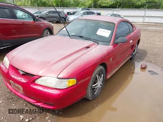 1995 Ford Mustang with VIN 1FALP4043SF275029, listed as a IAAI auction lot 42186318 with 107,651 mi miles and . Bid and sale history available at DreamBid. Image 2.