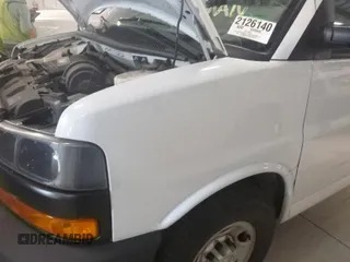 2019 Chevrolet Express Cargo Van with VIN 1GCWGAFG2K1328310, listed as a IAAI auction lot 42136986 with 88,759 mi miles. Bid and sale history available at carsss.com. Image 1.