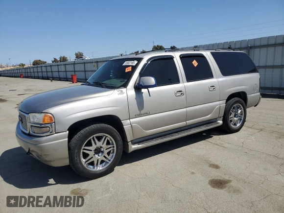 2006 GMC Yukon XL with VIN 1GKFK66U36J134459, listed as a Copart auction lot 55802165 with 277,366 mi miles and Salvage title. Bid and sale history available at DreamBid. Image 1.