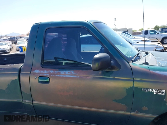 1999 Ford Ranger XL z VIN 1FTYR10V0XPA61389, wystawiony jako IAAI lot #42282825 z przebiegiem 235 720 mil mil oraz . Historia ofert i sprzedaży dostępna na DreamBid. Obrazek 13.