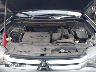 2015 Mitsubishi Outlander SE with VIN JA4AZ3A39FZ007936, listed as a IAAI auction lot 41003206 with 136,017 mi miles and . Bid and sale history available at DreamBid. Image 10.