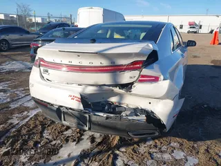 2014 Lincoln MKZ with VIN 3LN6L2GK3ER800458, listed as a IAAI auction lot 41233924 with 106,048 mi miles. Bid and sale history available at carsss.com. Image 4.