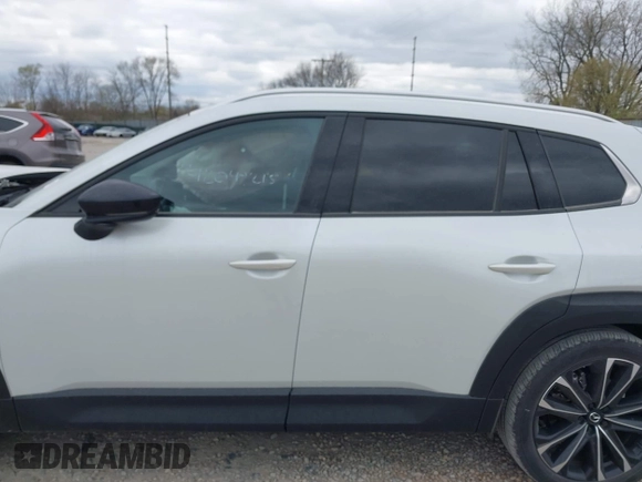 2023 Mazda CX-50 S Premium Plus with VIN 7MMVABEM7PN108865, listed as a IAAI auction lot 42049215 with 33,285 mi miles and . Bid and sale history available at DreamBid. Image 14.