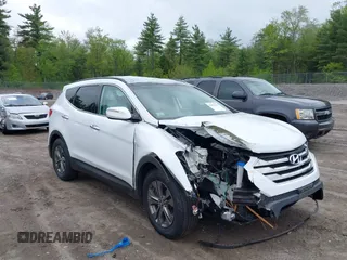2014 Hyundai Santa Fe z VIN 5XYZUDLB9EG227009, wystawiony jako IAAI lot #42272191 z przebiegiem 97 474 mil mil oraz . Historia ofert i sprzedaży dostępna na DreamBid. Obrazek 1.