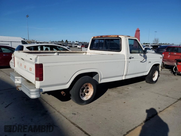 1985 Ford F-150 with VIN 1FTDF15YXFPA97115, listed as a Copart auction lot 87000634 with 28,229 mi miles and Clean Title. Bid and sale history available at carsss.com. Image 3.