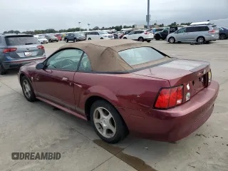 2004 Ford Mustang Deluxe with VIN 1FAFP44484F115156, listed as a Copart auction lot 75246024 with 0 mi miles and Non Repairable. Bid and sale history available at carsss.com. Image 2.