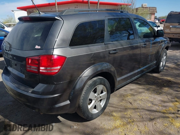 2017 Dodge Journey SE with VIN 3C4PDCAB9HT503979, listed as a IAAI auction lot 42116429 with 176,591 mi miles and . Bid and sale history available at DreamBid. Image 4.