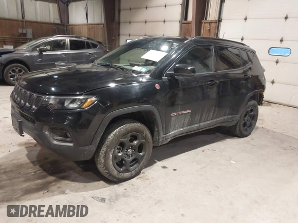 2023 Jeep Compass Trailhawk z VIN 3C4NJDDN5PT552364, wystawiony jako IAAI lot #41405314 z przebiegiem 20 823 mil mil oraz . Historia ofert i sprzedaży dostępna na DreamBid. Obrazek 2.