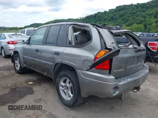 2007 GMC Envoy SLE with VIN 1GKDS13S272278285, listed as a IAAI auction lot 40006486 with 158,109 mi miles. Bid and sale history available at carsss.com. Image 3.