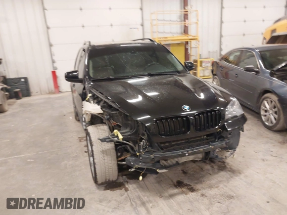 2012 BMW X5 35i with VIN 5UXZV4C55CL990510, listed as a IAAI auction lot 41849293 with 117,522 mi miles and . Bid and sale history available at DreamBid. Image 6.