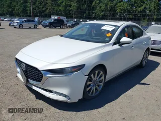 2021 Mazda 3 with VIN JM1BPBDL6M1340029, listed as a IAAI auction lot 42461850 with 79,798 mi miles and . Bid and sale history available at DreamBid. Image 6.