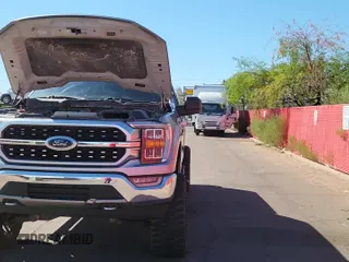 2021 Ford F-150 XL z VIN 1FTFW1E52MKD94436, wystawiony jako Copart lot #90057115 z przebiegiem 72 923 mil mil oraz Czysty tytuł • Clean title. Historia ofert i sprzedaży dostępna na DreamBid. Obrazek 11.