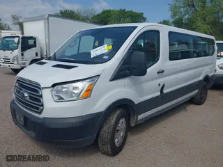 2019 Ford Transit Passenger Wagon XL with VIN 1FBZX2ZM2KKB65886, listed as a IAAI auction lot 41911579 with NaN miles. Bid and sale history available at carsss.com. Image 17.