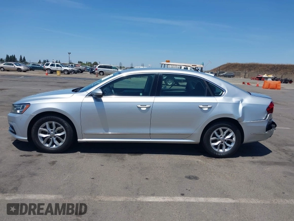 2017 Volkswagen Passat S with VIN 1VWAT7A32HC009657, listed as a IAAI auction lot 42541472 with 100,026 mi miles and . Bid and sale history available at DreamBid. Image 14.