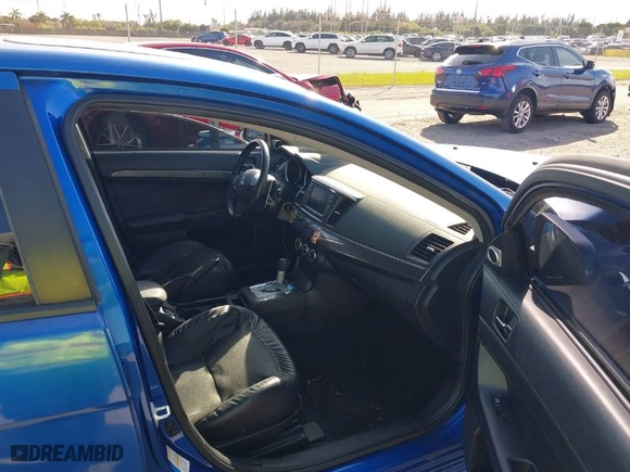 2010 Mitsubishi Lancer GTS with VIN JA32X8HW4AU004864, listed as a IAAI auction lot 41506558 with 141,514 mi miles. Bid and sale history available at carsss.com. Image 5.
