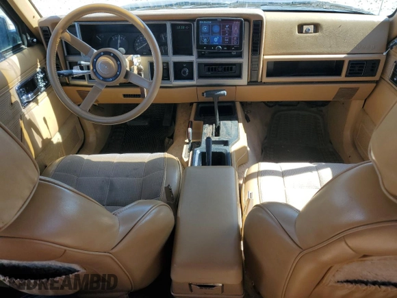 1987 Jeep Cherokee with VIN 1JCMT7842HT114597, listed as a Copart auction lot 49319945 with 230,675 mi miles and Clean title. Bid and sale history available at DreamBid. Image 8.